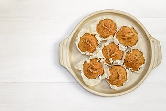 Homemade Muffins on Ceramic Plate with Copy Space