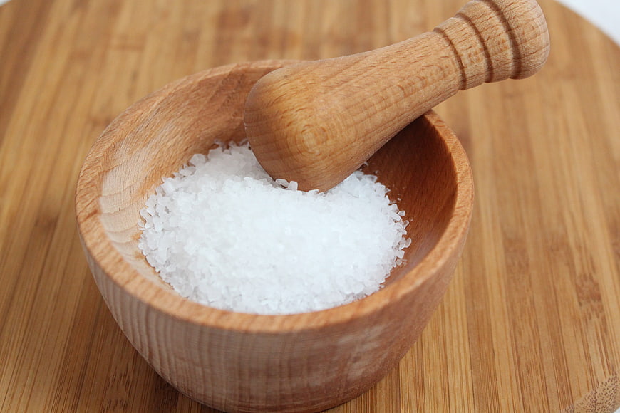 Coarse Sea Salt in Wooden Mortar and Pestle