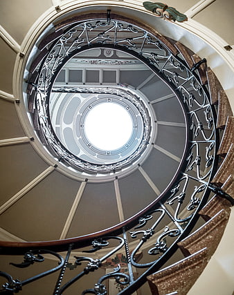 Spiral Staircase View Looking Up To Circular Skylight