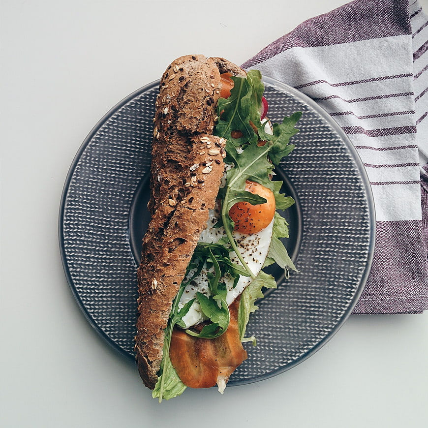 Healthy Whole Grain Baguette Sandwich with Eggs and Arugula