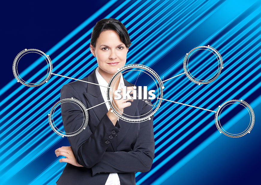 Businesswoman touching skills concept on digital interface