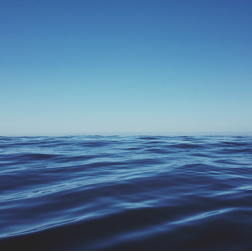 Serene Blue Ocean Horizon with Gentle Waves