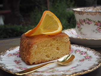Vintage Orange Cake Slice on Floral Plate with Tea Cup