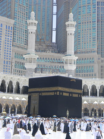 Kaaba in Mecca with Minarets and Pilgrims