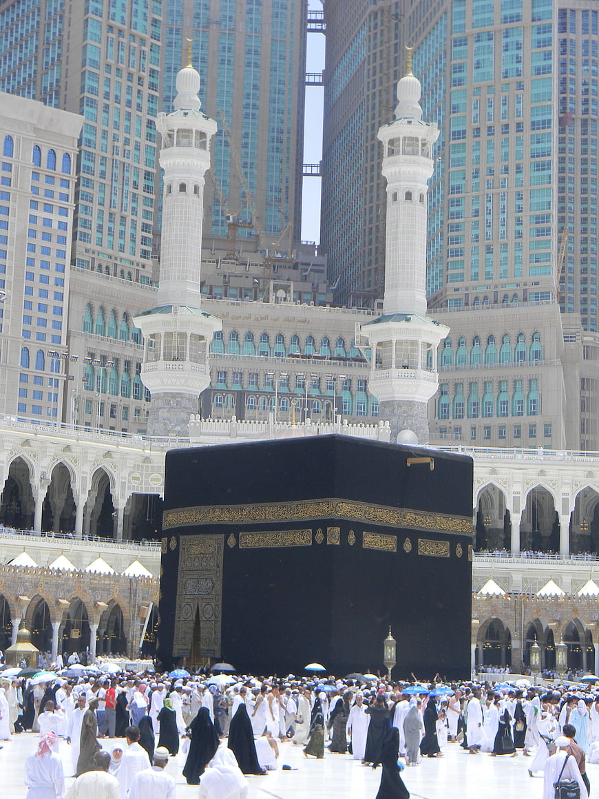 Kaaba in Mecca with Minarets and Pilgrims