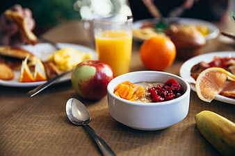 Healthy Breakfast Spread with Oatmeal, Fruit, and Juice
