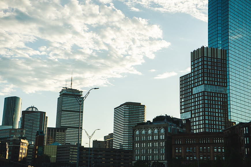 Modern City Skyline with Skyscrapers and Clouds