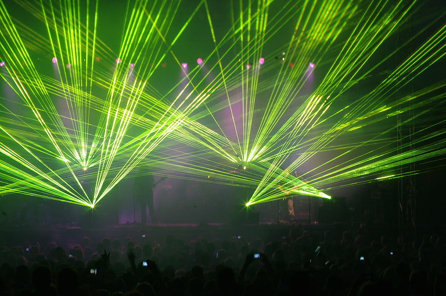 Vibrant Green Laser Light Show at a Live Concert