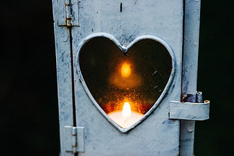 Candle in Heart-Shaped Lantern Window