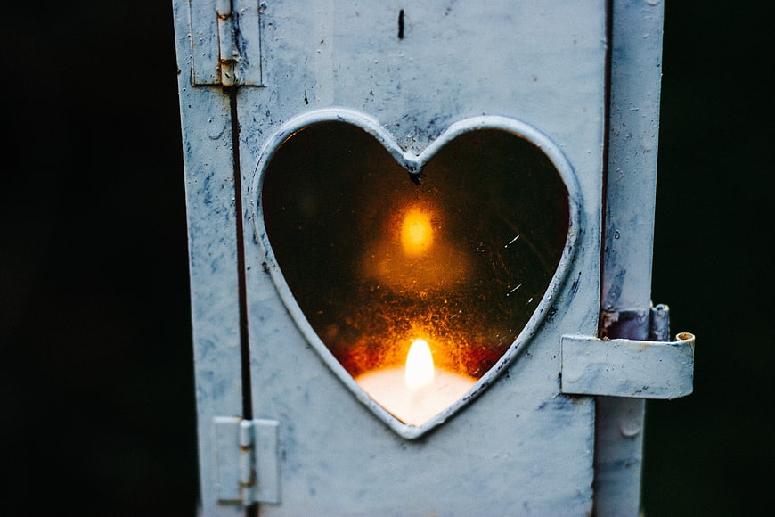 Candle in Heart-Shaped Lantern Window