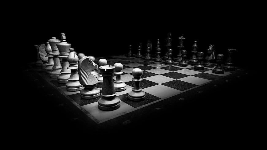 Dramatic Black and White Chess Board with Pieces