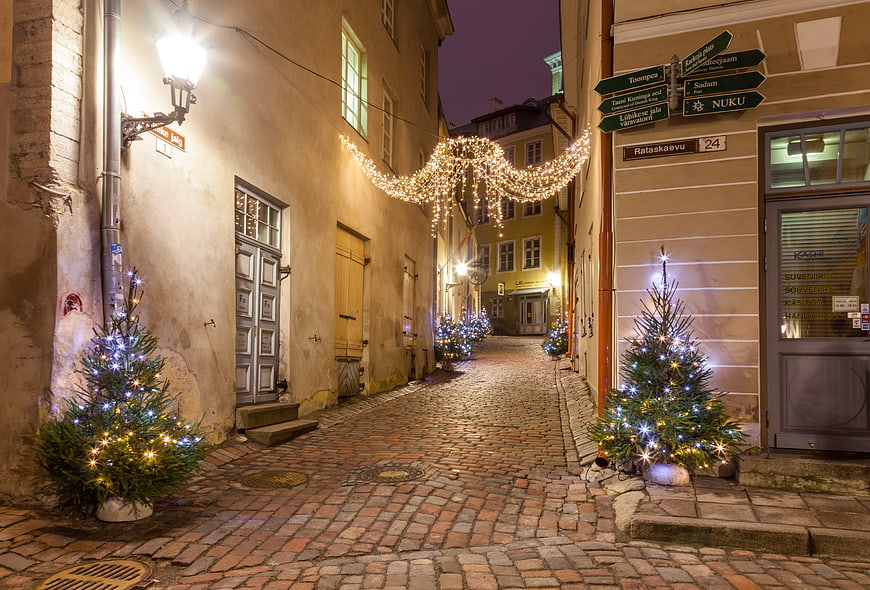 Christmas Lights In Old Town Cobblestone Street At Night
