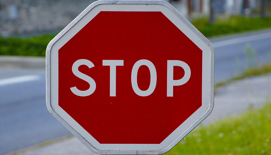 Close-up of Red Stop Sign on Roadside