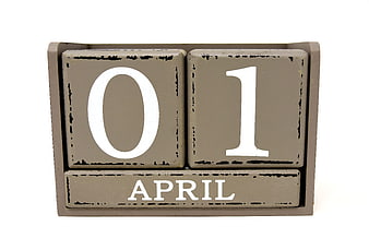 Rustic Wooden Perpetual Calendar Displaying April 1st