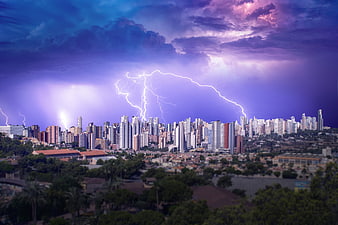 Dramatic Lightning Storm Over City Skyline