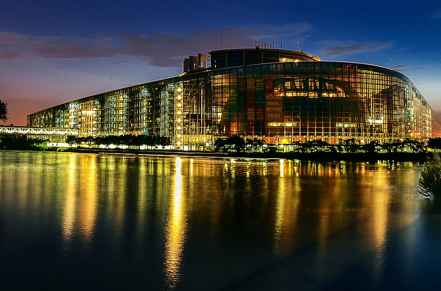 European Parliament Building at Night with River Reflection
