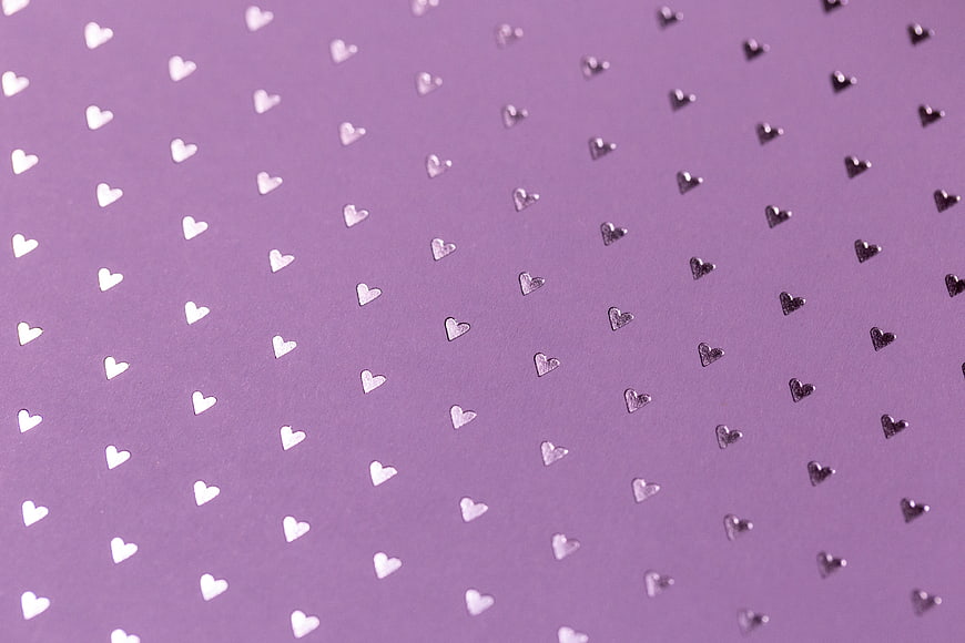 Purple Paper Background with Silver Foil Heart Pattern