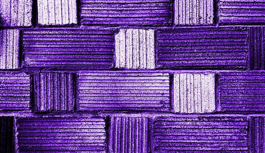 Purple textured brick wall pattern background