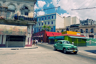 Vintage Green Car on Colorful Havana Street