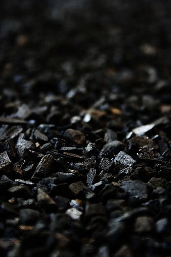 Close-up texture of black charcoal pieces