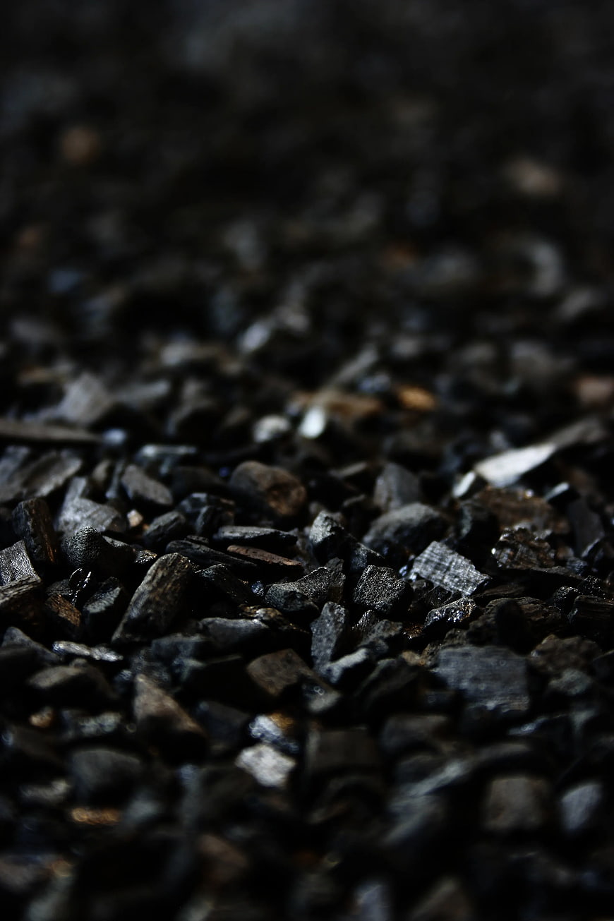 Close-up texture of black charcoal pieces