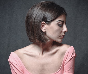 Profile Portrait of Woman with Short Hair and Pink Top