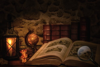 Vintage study still life with old books, lantern, and globe