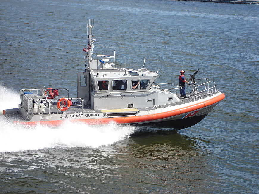 U.S. Coast Guard Boat Speeding on Water