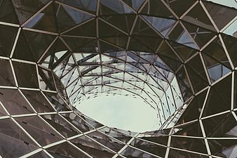 Abstract geometric glass dome architecture looking up