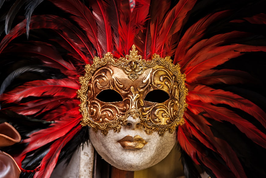 Ornate Venetian Mask with Red and Black Feathers