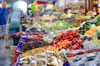 Fresh Produce Display At A Busy Indoor Farmers Market