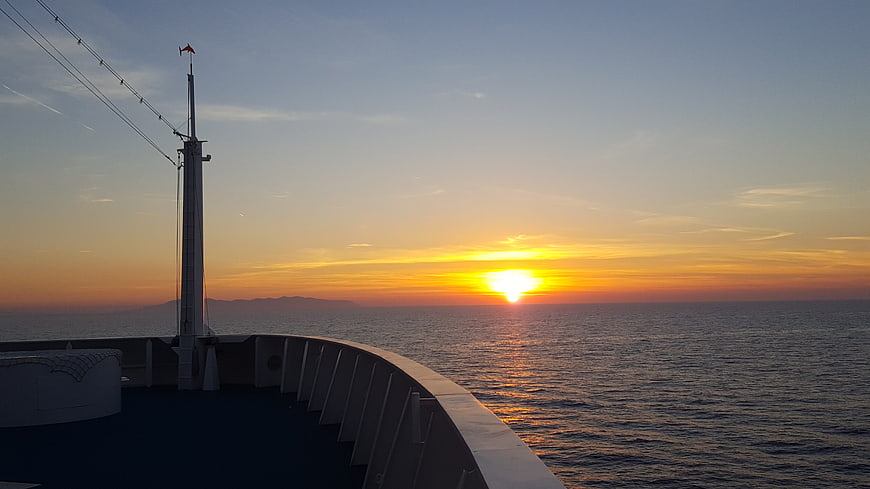Sunset View from Cruise Ship Deck Over Ocean