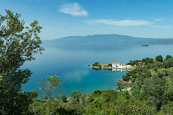 Scenic coastal landscape with white houses and turquoise sea