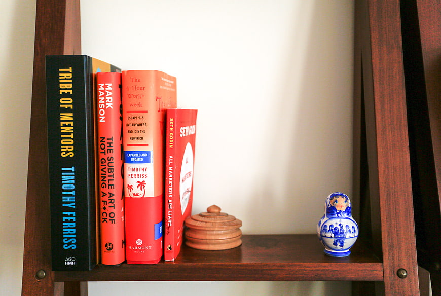 Business Books on Wooden Shelf with Decor