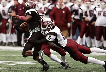 American Football Tackle Action on Green Field