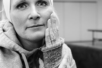 Emotional Black and White Portrait of Woman with Headscarf