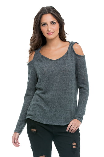 Woman in Gray Cold Shoulder Sweater and Ripped Jeans