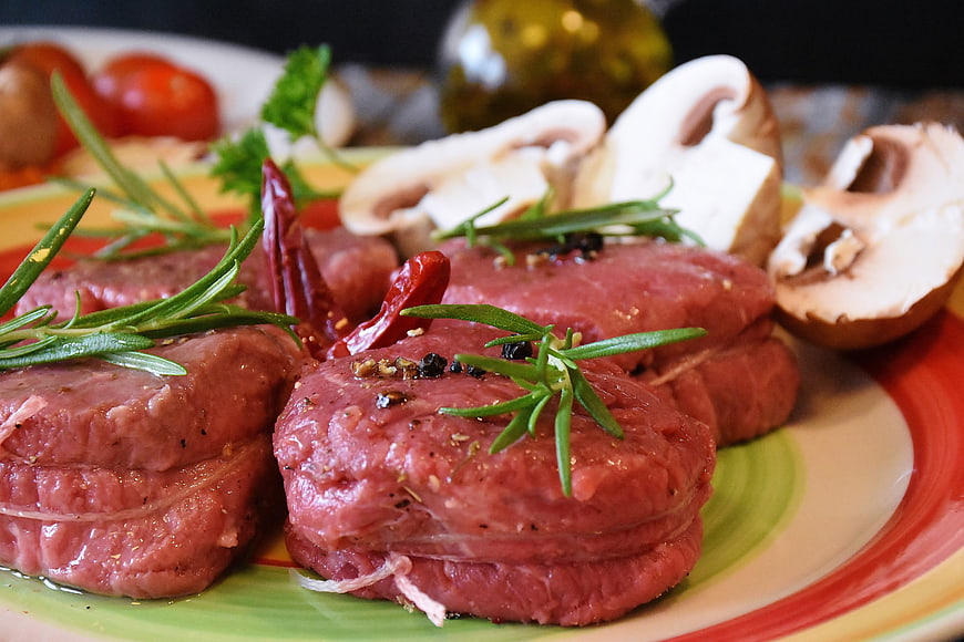 Raw Beef Fillet Mignon with Rosemary and Mushrooms
