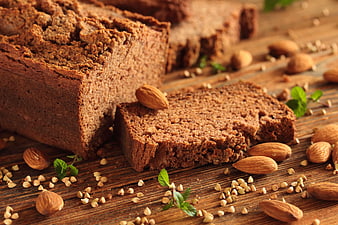 Sliced gluten-free almond bread on rustic wooden table