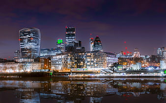 London Skyline at Night with Reflections on the Thames