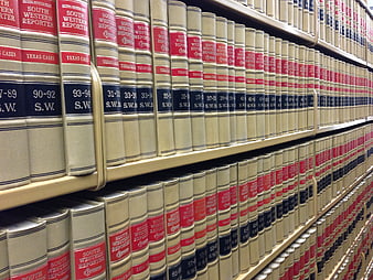 Rows of South Western Reporter Law Books on Library Shelves