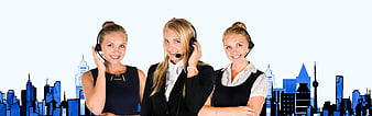 Three female call center agents with headsets against city skyline
