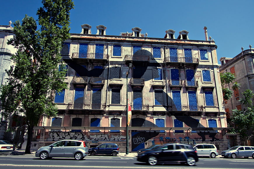Street Art Mural on Old Lisbon Building Facade