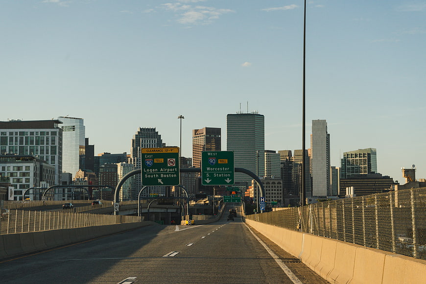 Boston Skyline View from Highway with Road Signs