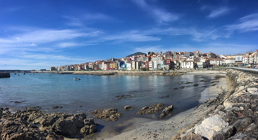 Panoramic View of Colorful Coastal Town on Sunny Day