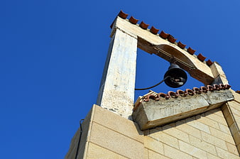 Church Bell Tower Against Blue Sky