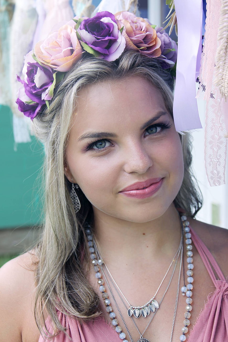Blonde Woman with Purple Flower Crown and Silver Jewelry