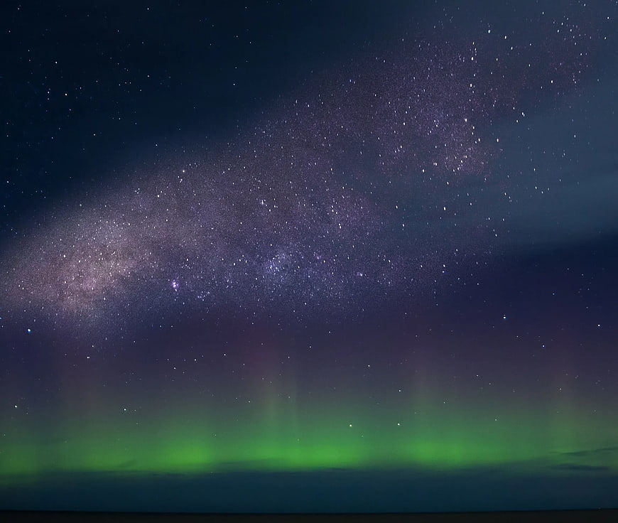 Green Aurora Borealis and Milky Way Starry Night Sky