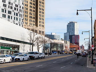 Wide City Street with Modern and Historic Buildings