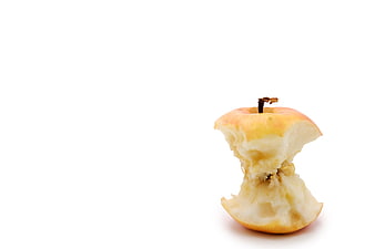 Partially Eaten Apple Core On White Background
